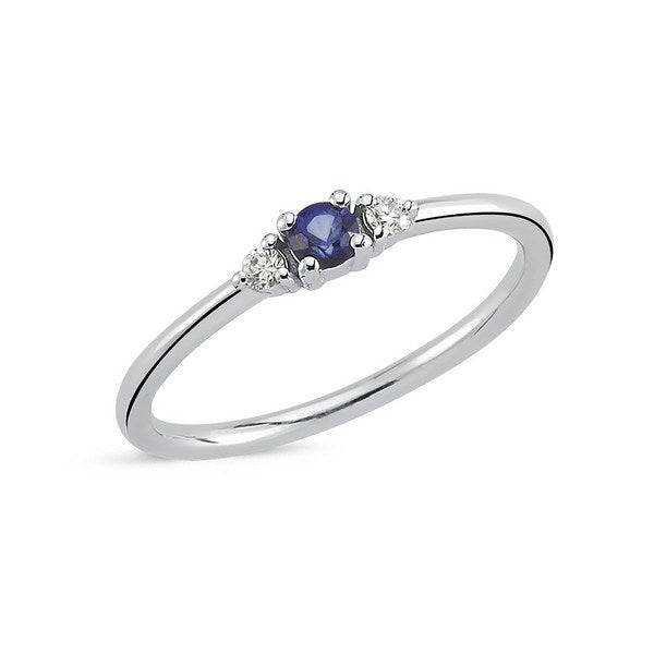 Petit ring i 14 karat hvidguld med blå safir og 0,05 ct diamanter fra Nuran